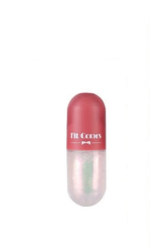 Close-up of Day Night Instant Volume Lip Plumper Oil bottle, emphasizing its clear, nourishing formula for fuller lips and reduced fine lines.